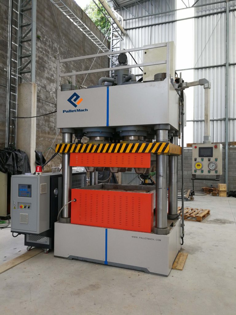 compressed wood pallet machine